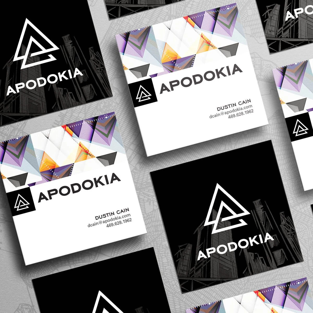 APODOKIA square business cards in black and white with prismatic triangle graphics