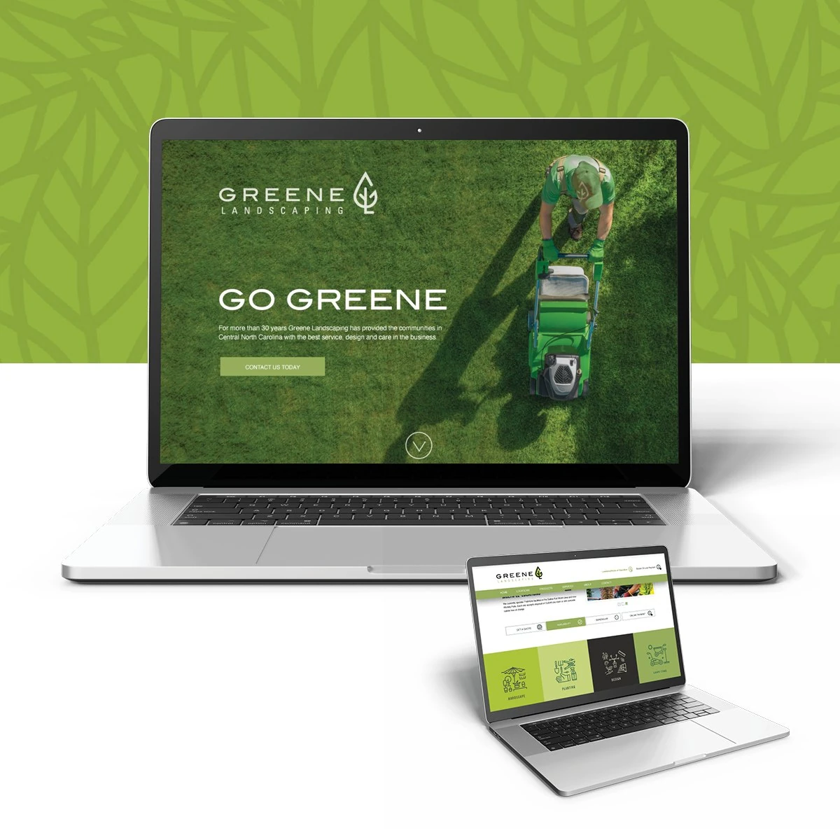 GREENE Landscaping website “Go Greene” homepage on a large laptop, with a second laptop showing the service icons