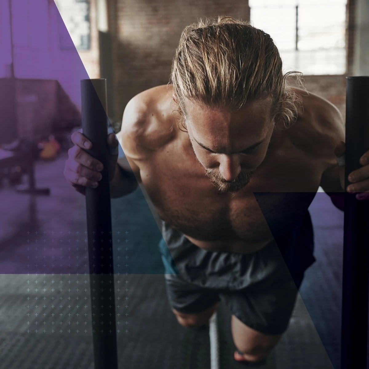 An athlete pushing a weight sled in a gym, with angled purple shapes and a plus-sign grid over the photo