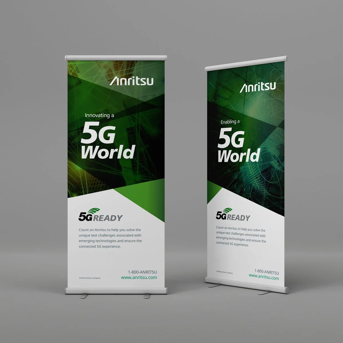 Two green Anritsu “5G World” roll-up banners