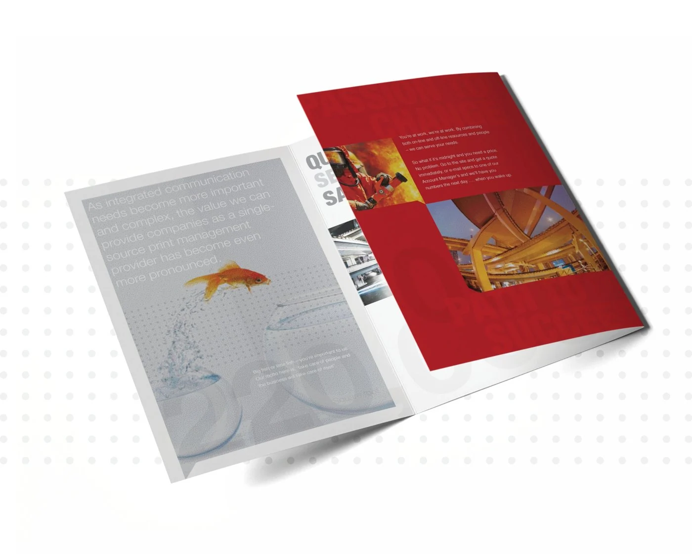 The red folder standing open, with the goldfish panel beside a red panel of firefighter and highway photos