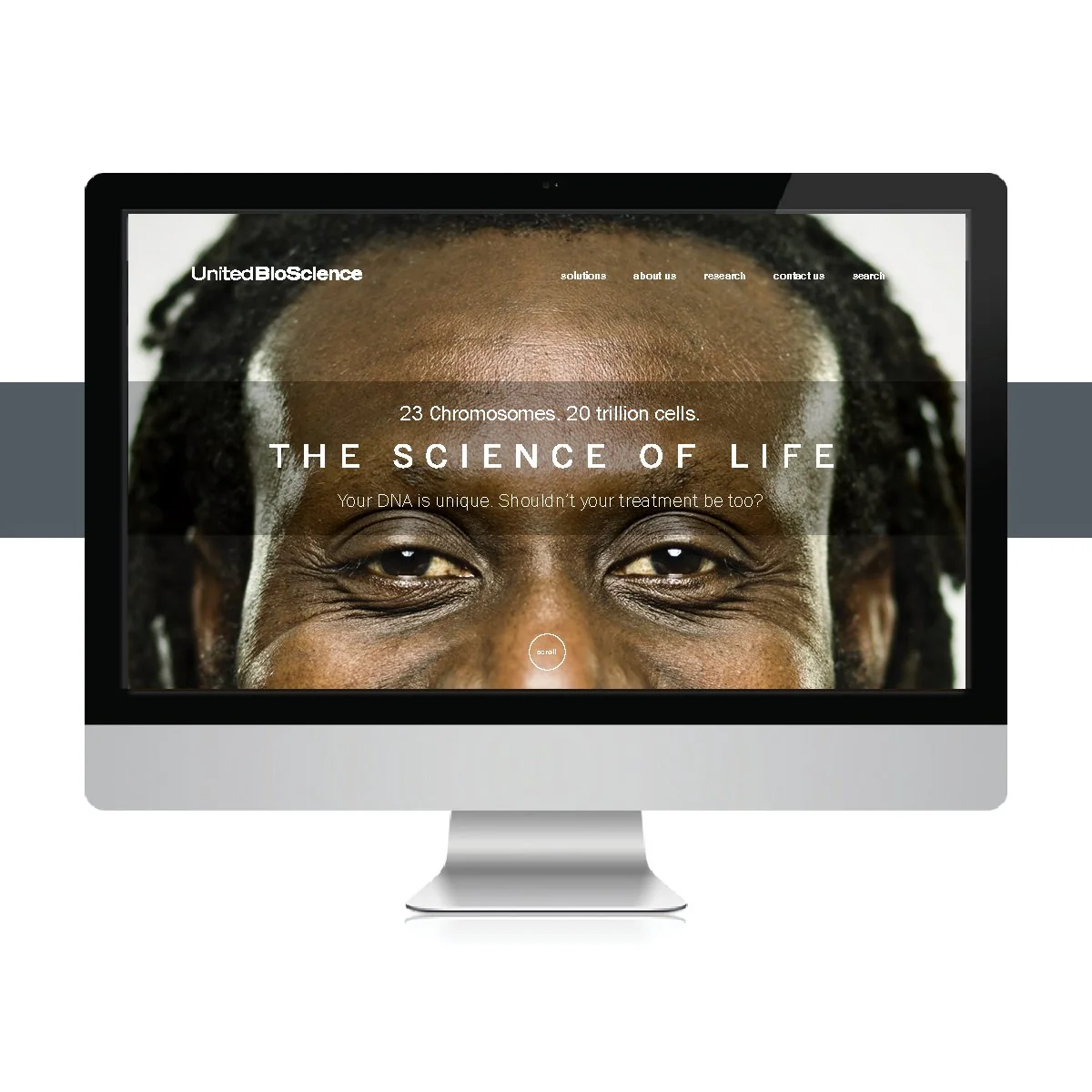 United Bioscience website on a desktop monitor: a close-up face behind “The Science of Life”