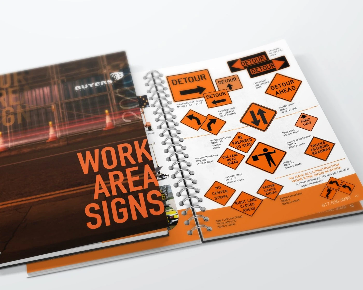 Open Buyers catalog spread of orange construction work zone signs beside the cover
