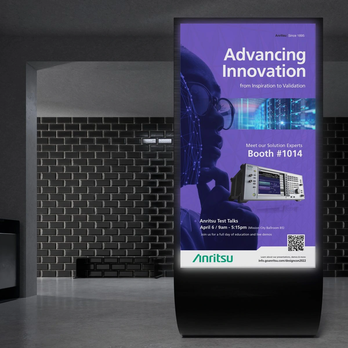 Illuminated Anritsu “Advancing Innovation” kiosk display for Booth #1014