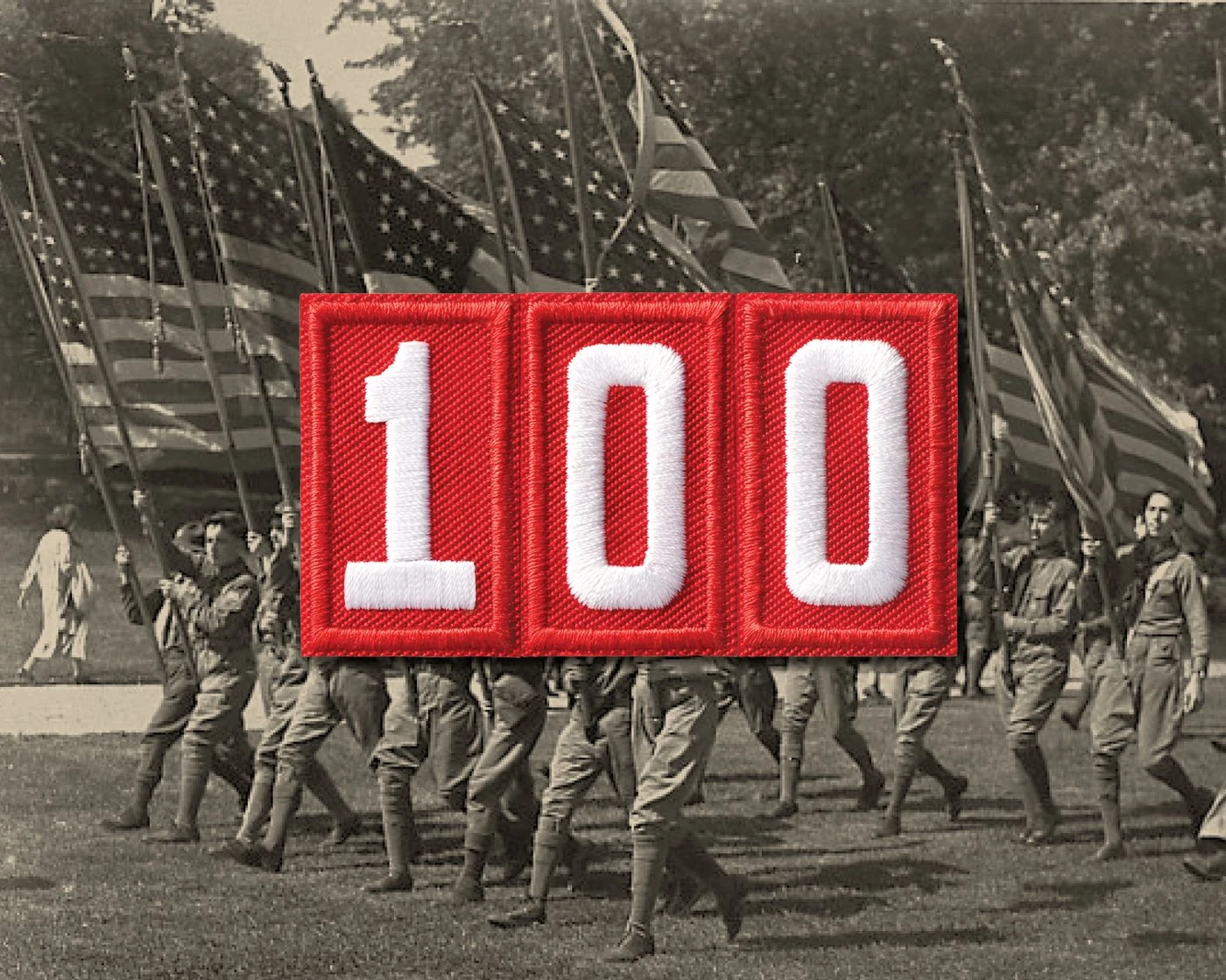 Embroidered red 100 patch over a sepia photo of early Scouts marching with flags