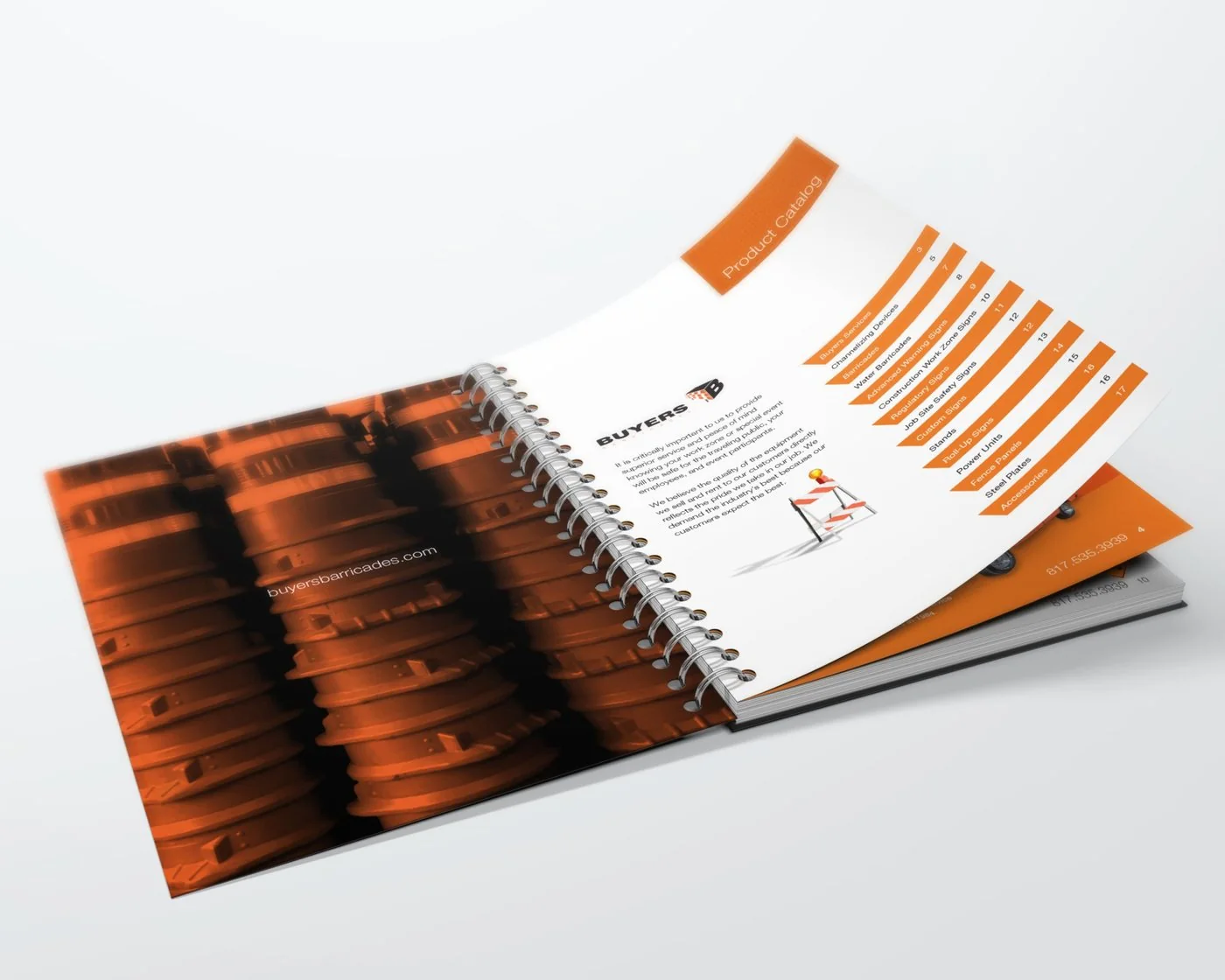 Buyers catalog opened to its table of contents beside an orange-toned photo of stacked barrels