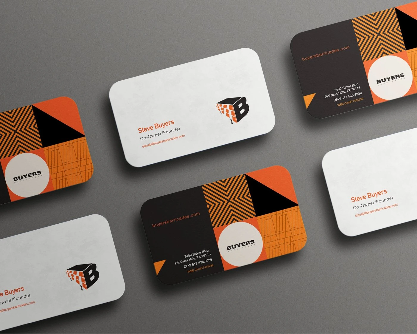 Rounded Buyers Barricades business cards in white and charcoal with orange chevron patterns