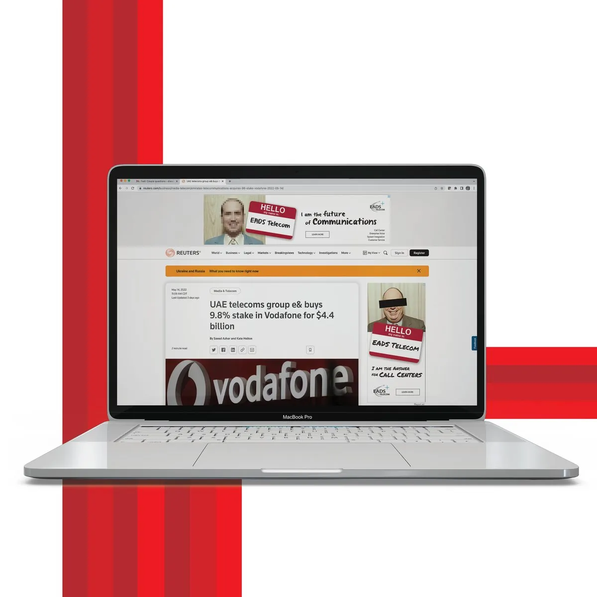 EADS Telecom leaderboard and skyscraper ads on a Reuters article, shown on a laptop